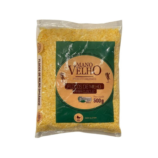 Pacote-transparente-de-floco-de-milho-com-rotulo-verde-e-bege-destacando-peso-de-500g-e-selo-de-produto-sem-gluten-na-embalagem.