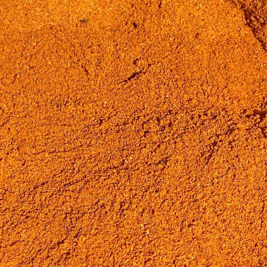 Close-up-de-pimenta-chilli-moida-com-textura-fina-e-coloracao-vermelha-intensa-ideal-para-realcar-o-sabor-das-receitas