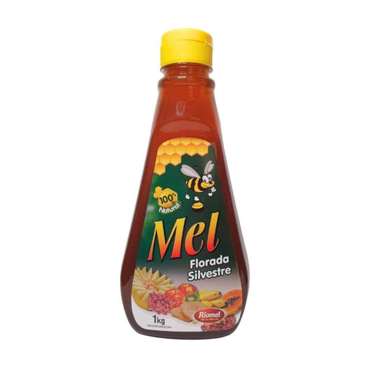 Frasco-transparente-com-tampa-amarela-contendo-mel.-Rotulo-verde-exibe-ilustracoes-de-favos-de-mel-abelha-e-frutas-variadas.