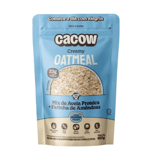 Embalagem-azul-e-bege-de-Oatmeal-Creamy-Cacow-450g-com-mix-de-aveia-proteica-e-farinha-de-amendoas-destaque-para-23g-de-proteina.