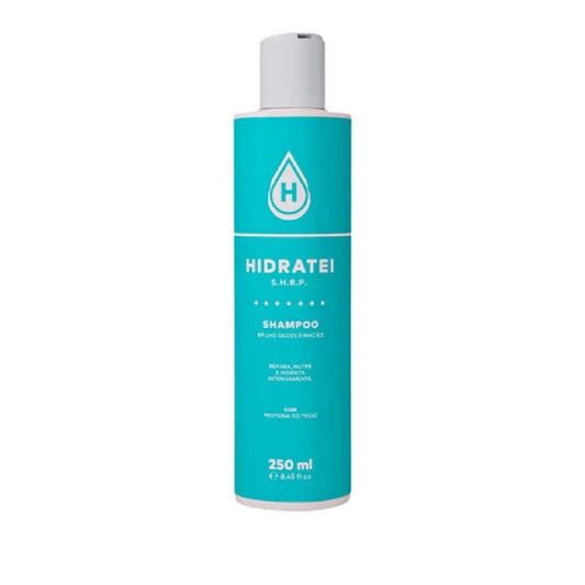 Frasco-cilindrico-azul-turquesa-com-tampa-branca.-Rotulo-destaca-o-nome-e-beneficios-do-Shampoo-Vegano-incluindo-brilho-e-hidratacao-intensa.